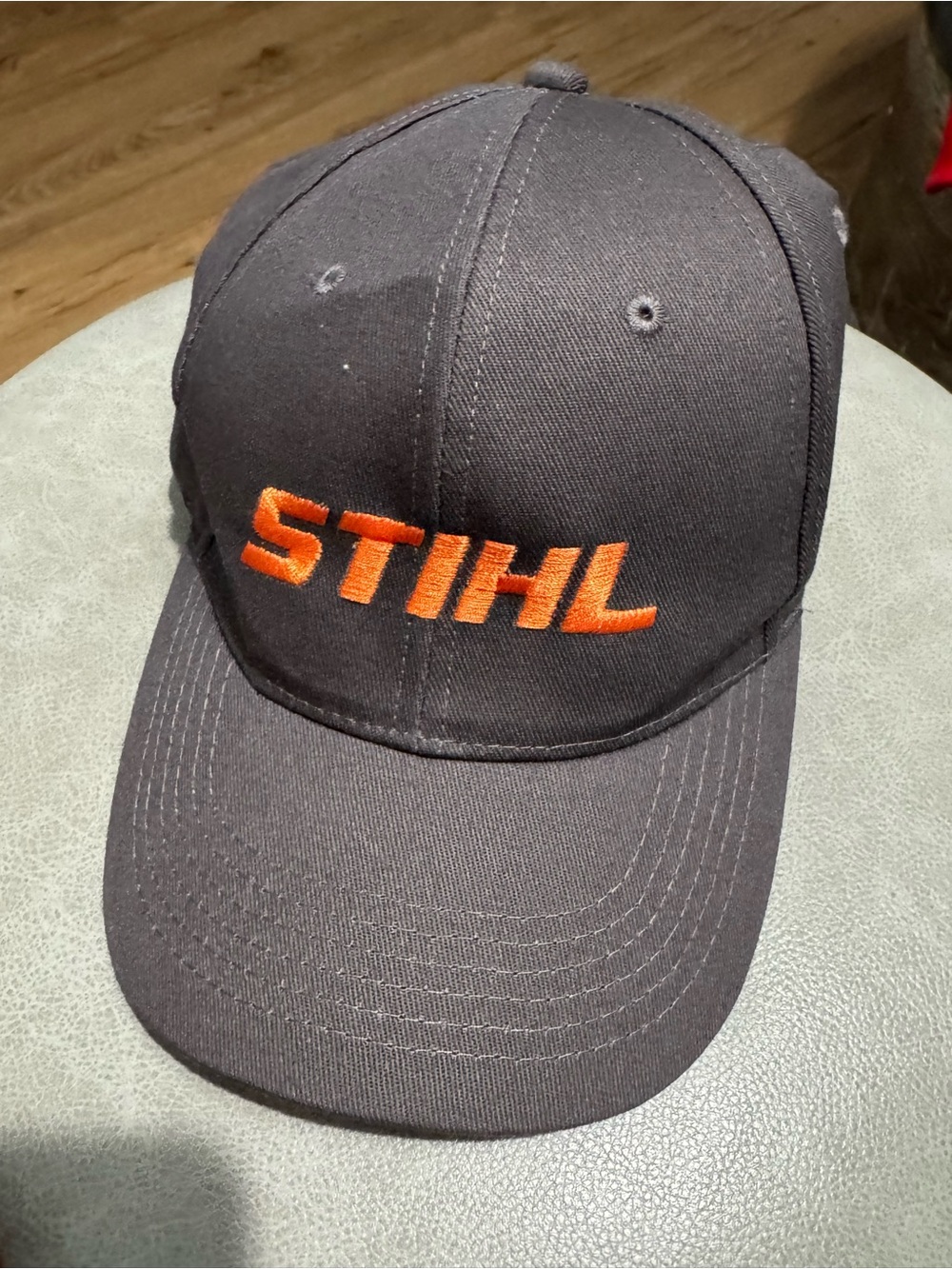 STIHL Gray Orange Trucker Adjustable Hat By Outdoor Cap